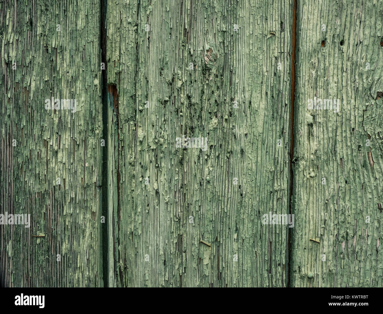 wooden surface with old paint peeling off Stock Photo