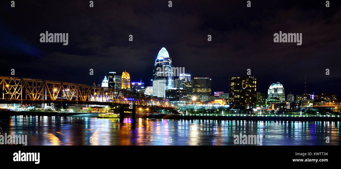 downtown lights of Cincinnati reflect off the Ohio River Stock Photo