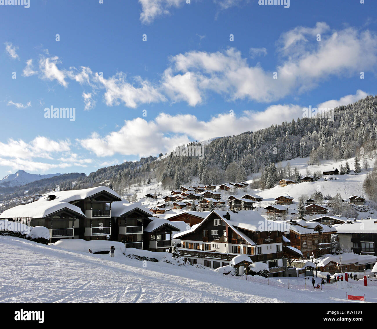 Winter scenes and showing the Hotel Christiana in the ski and snowboarding resort of Les Gets, France Stock Photo