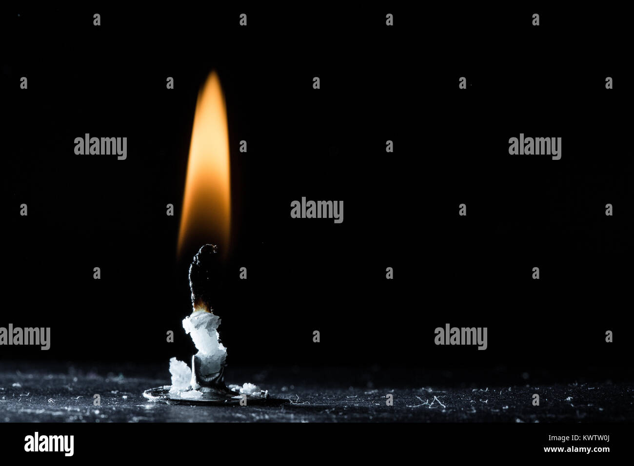 Burning wick without candle left Stock Photo Alamy