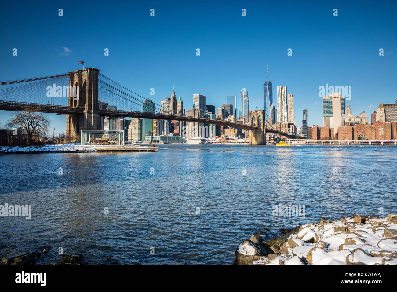 Brooklyn Bridge and Manhattan downtown on the background Stock Photo