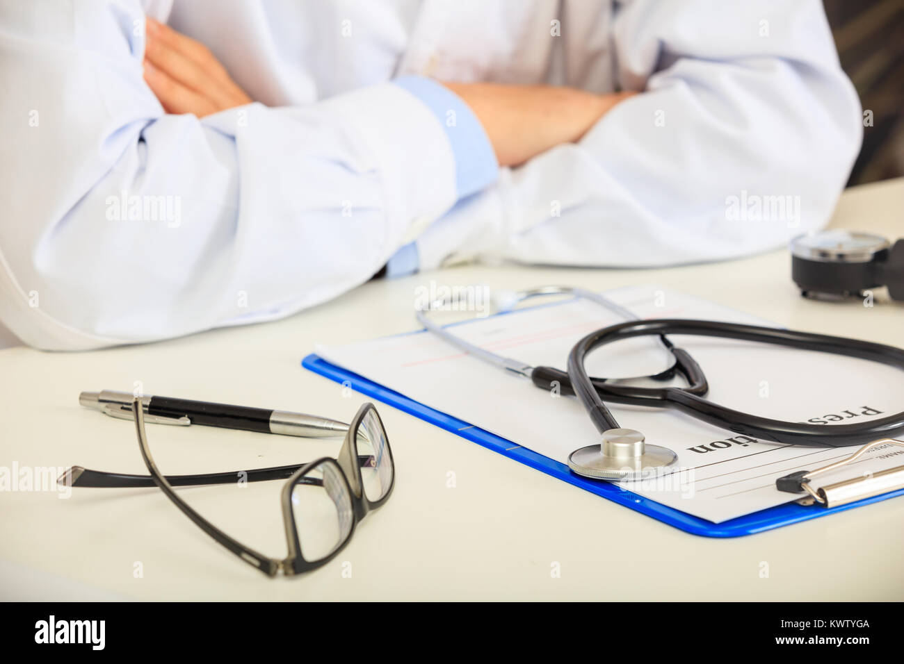 Doctor pharmacist sitting desk hi-res stock photography and images - Alamy