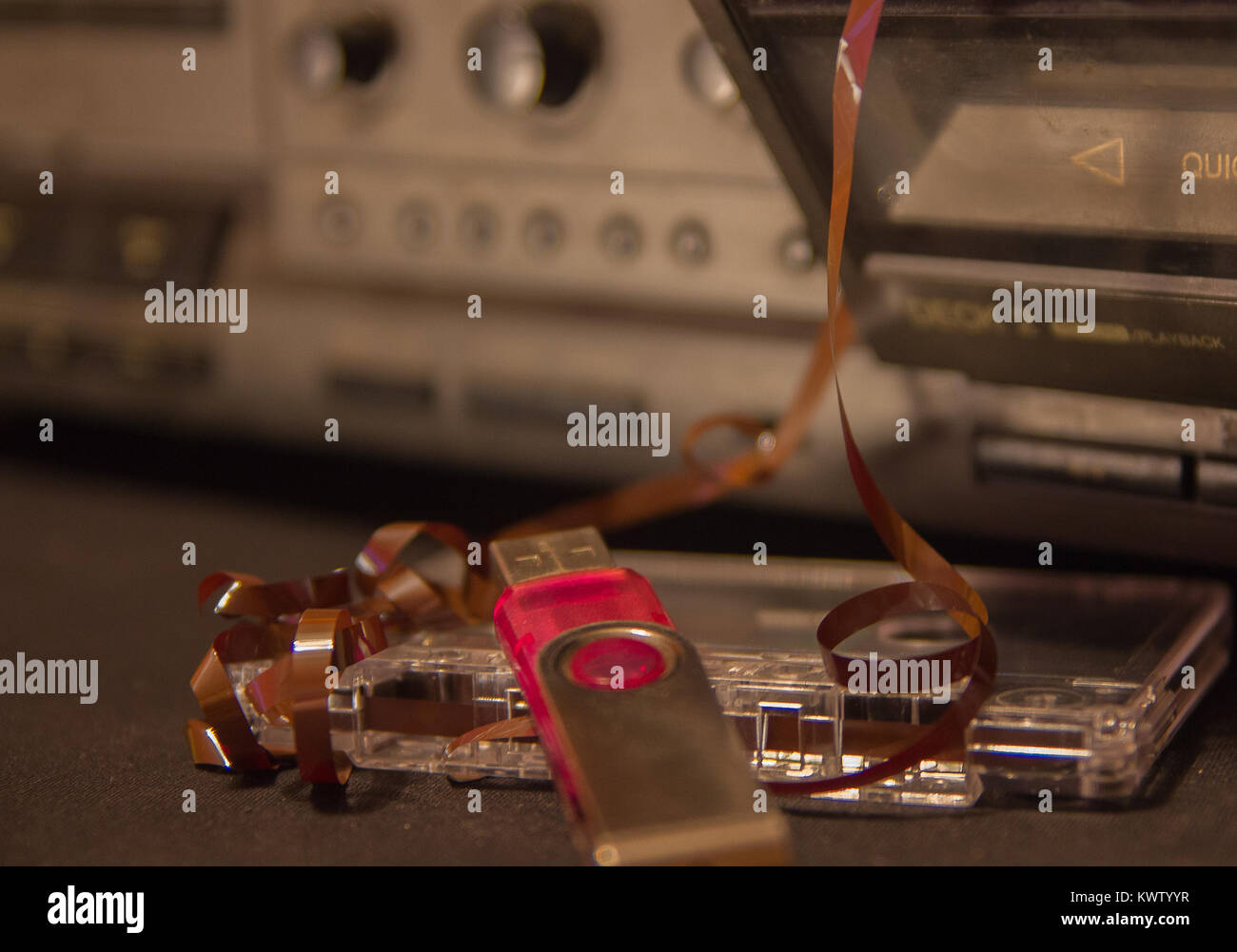 old audio cassettes with a tangled tape, cassette tape recorder and ...