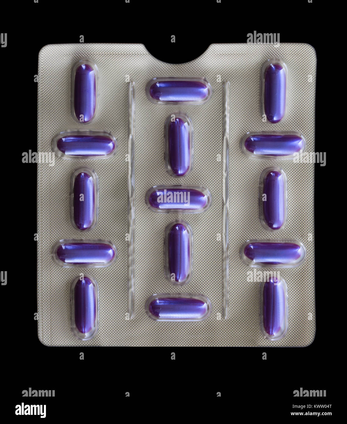Blister Pack with purple pills on a black background Stock Photo