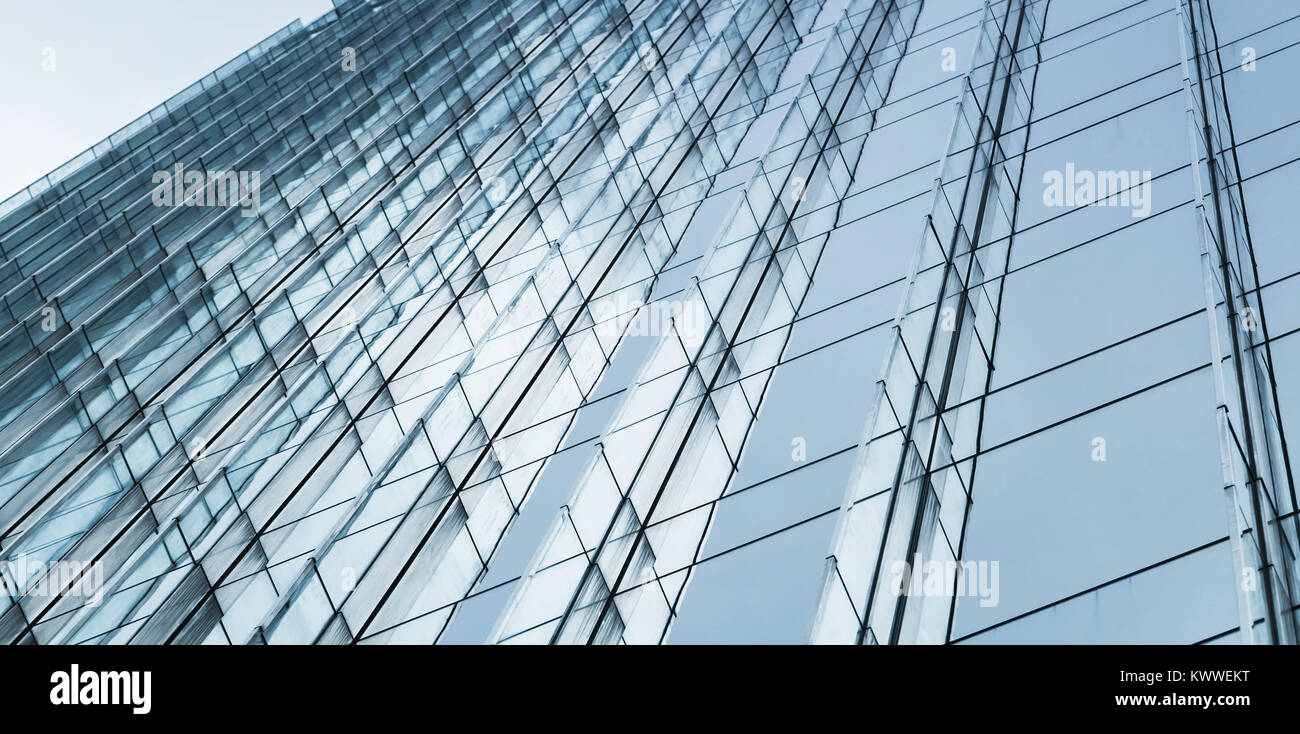 Abstract blue background with modern architecture. Facade made of glass ...
