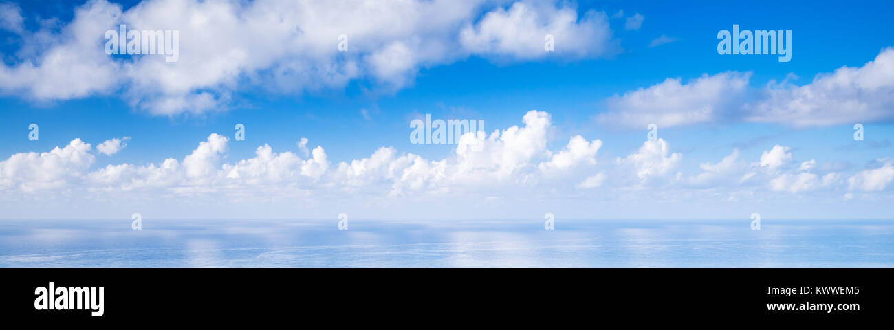 Panoramic blue sky background, white cumulus clouds over ocean Stock ...