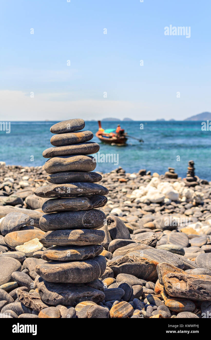 Stones on stack on the beach and blue sky Stock Photo - Alamy