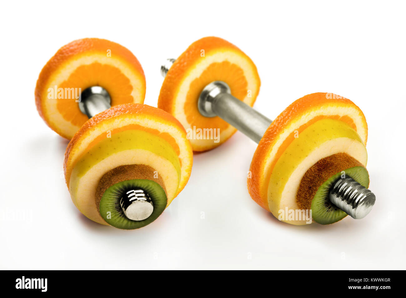 fruit dumbbells - healthy lifestyle and eating concept Stock Photo