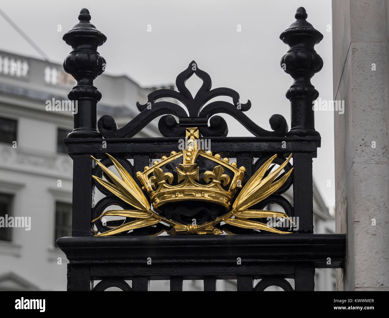 LONDON, UK - NOVEMBER 01, 2017:  Gold painted ornamental detail on the Gates at Buckingham Palace Stock Photo