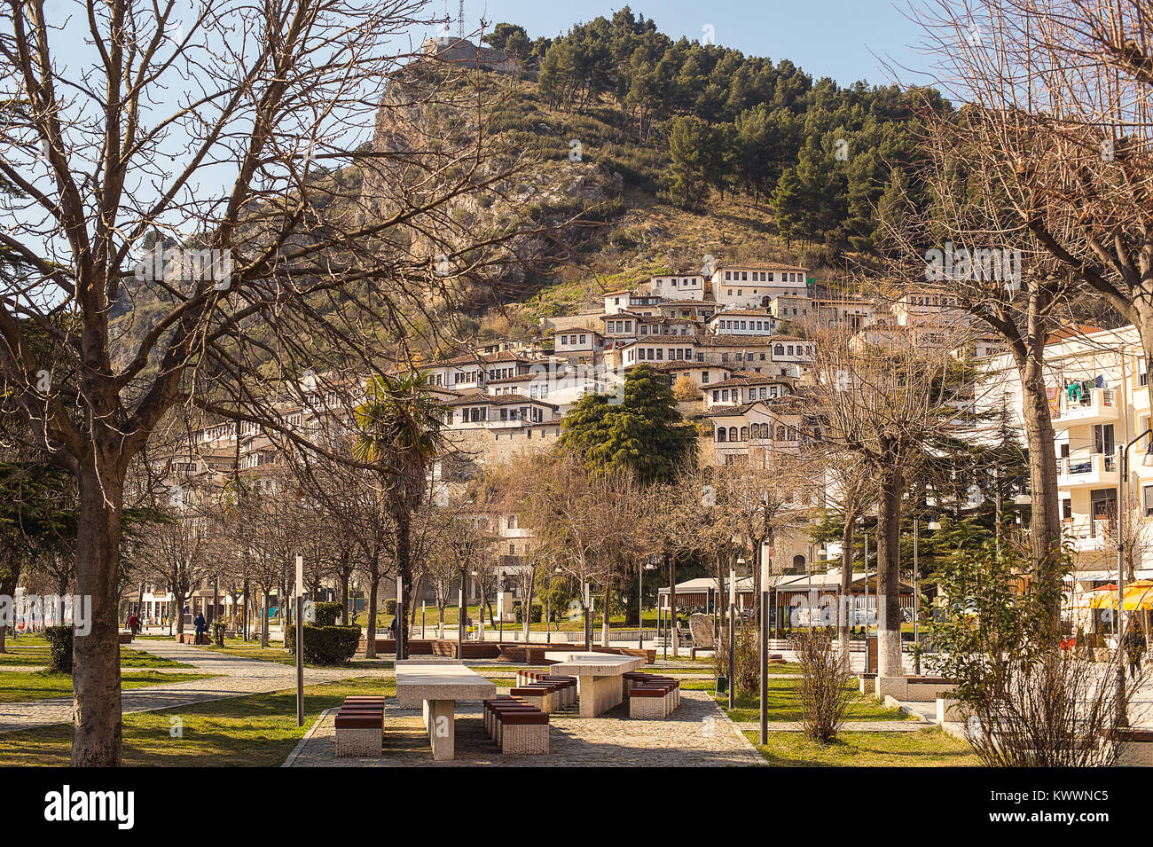 View to Berat, historic city in the south of Albania, during a sunny day. Tiny stone streets and white houses built on a high hill one over another. Stock Photo