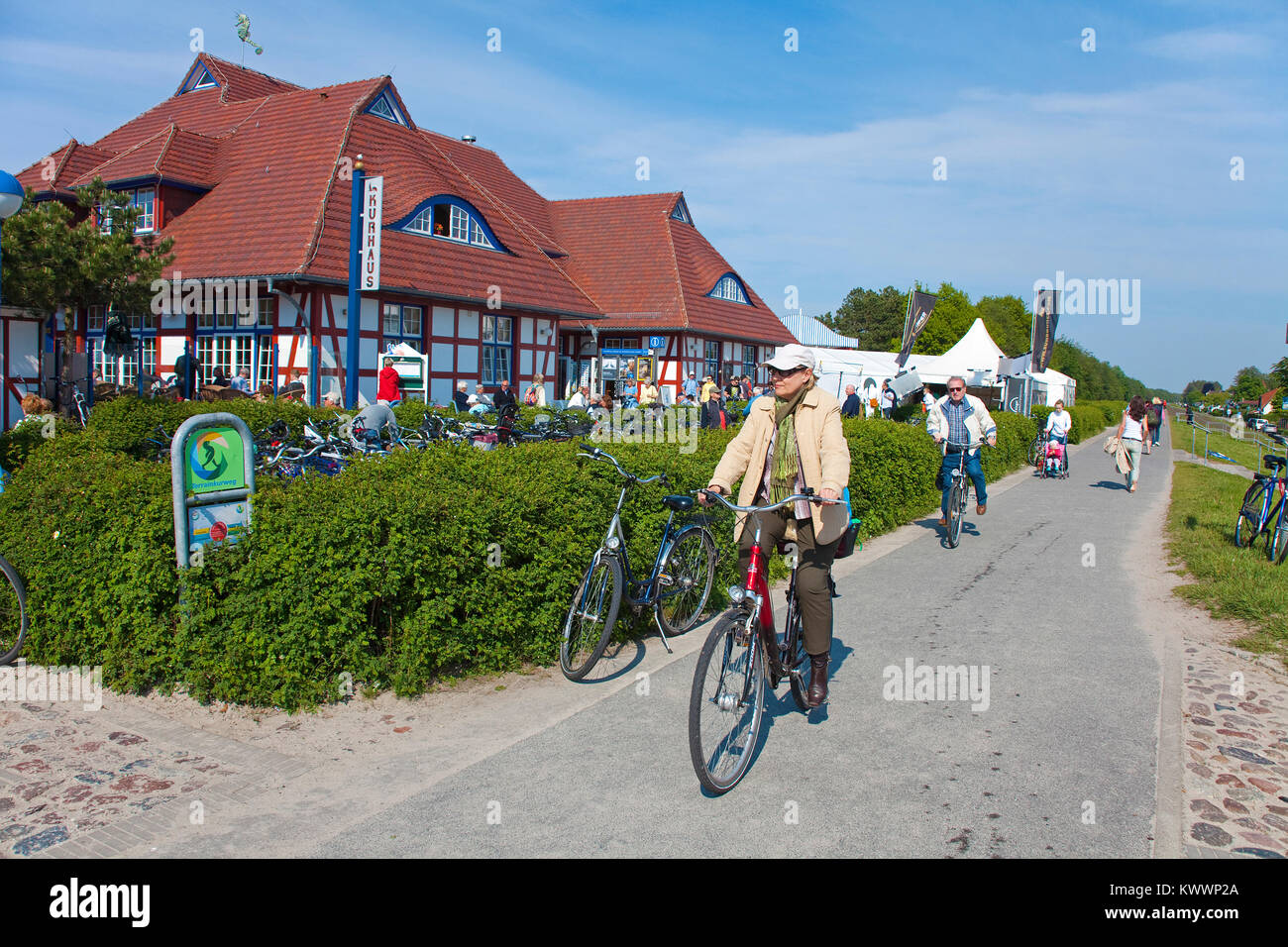 Cyclist on bike trail at the kurhaus of Zingst, Fishland, Mecklenburg-Western Pomerania, Baltic sea, Germany, Europe Stock Photo