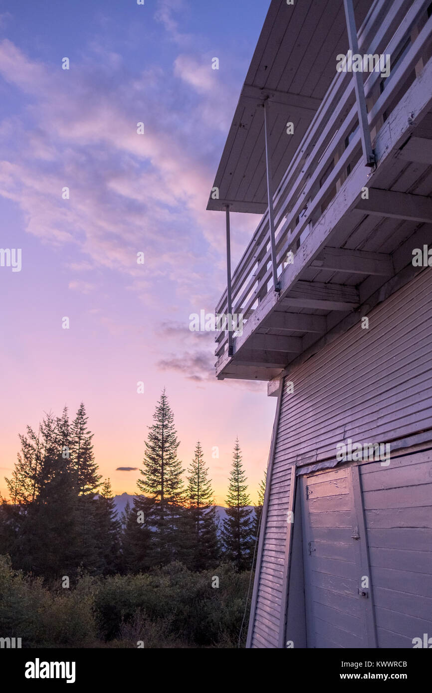 Fire lookout at twilight - White Cabin - Purple sky Stock Photo