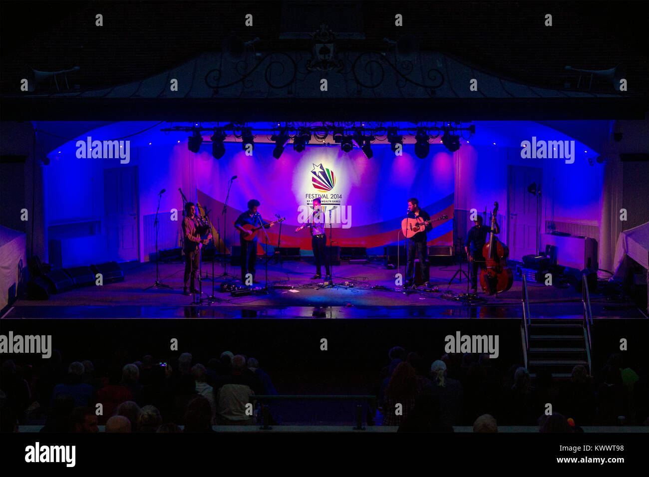 Performers playing folk music on stage, 30th July, 2014, during the XX Commonwealth Games' Festival 2014, Kelvingrove Bandstand, Glasgow, Scotland Stock Photo