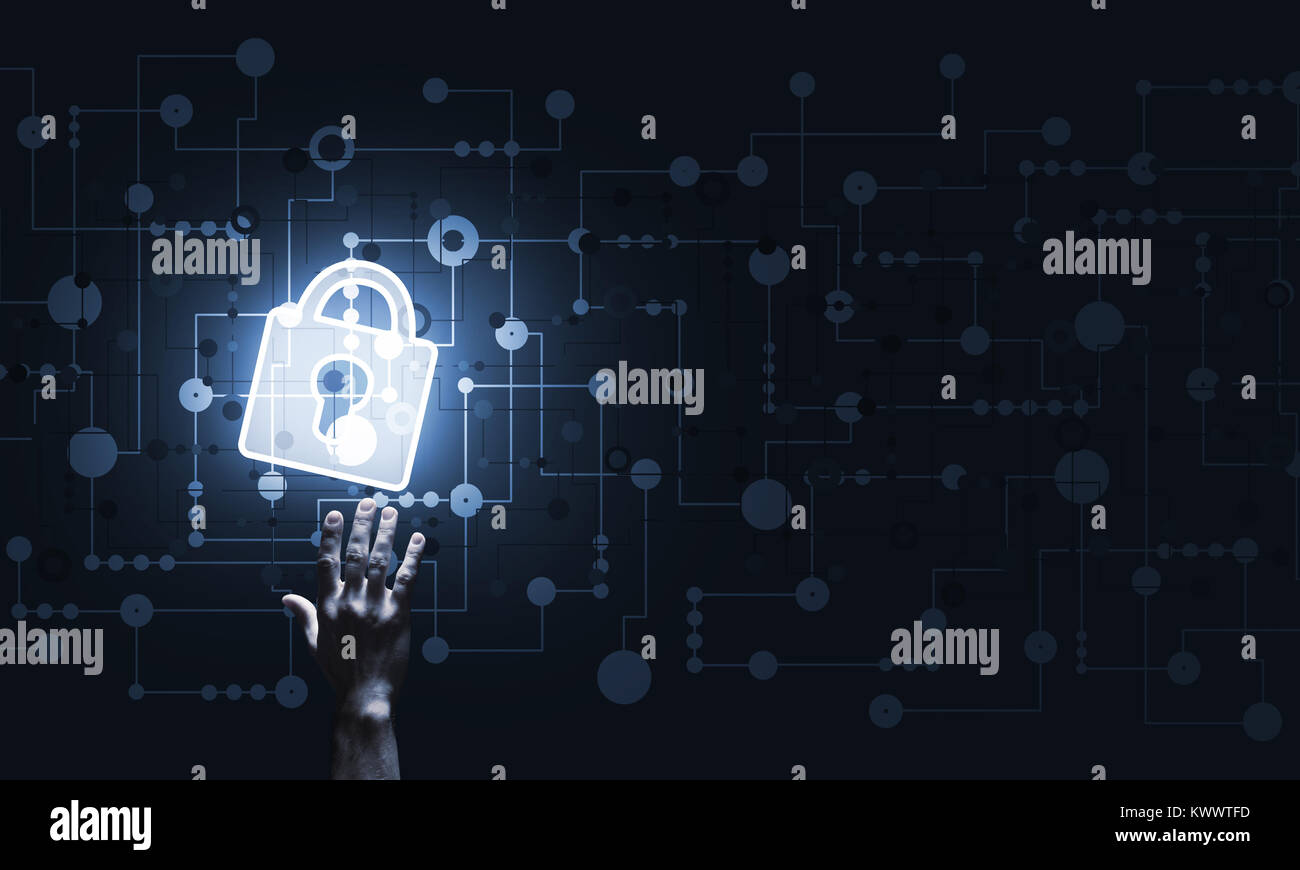 Lock glowing icon pressed with finger on dark background Stock Photo ...