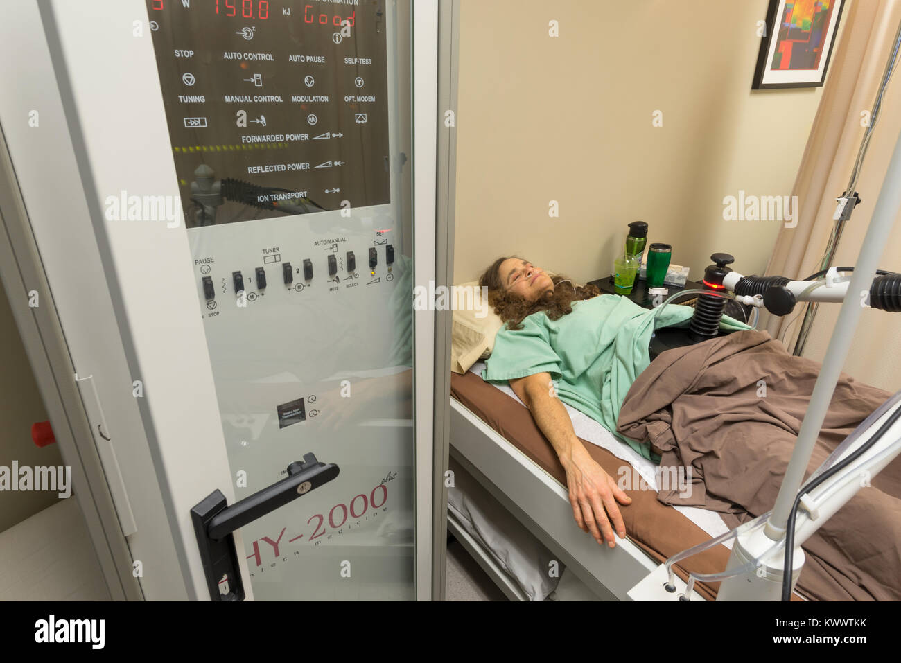 Cancer patient receiving Loco-Regional Hyperthermia treatment at the Integrated Health Clinic in Fort Langley, British Columbia, Canada. Stock Photo
