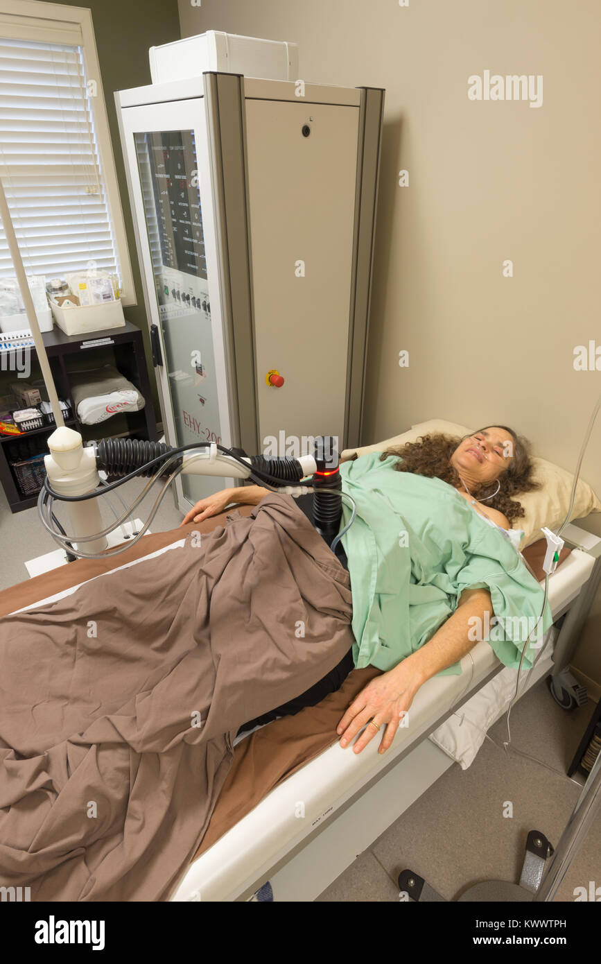 Cancer patient receiving Loco-Regional Hyperthermia treatment at the Integrated Health Clinic in Fort Langley, British Columbia, Canada. Stock Photo