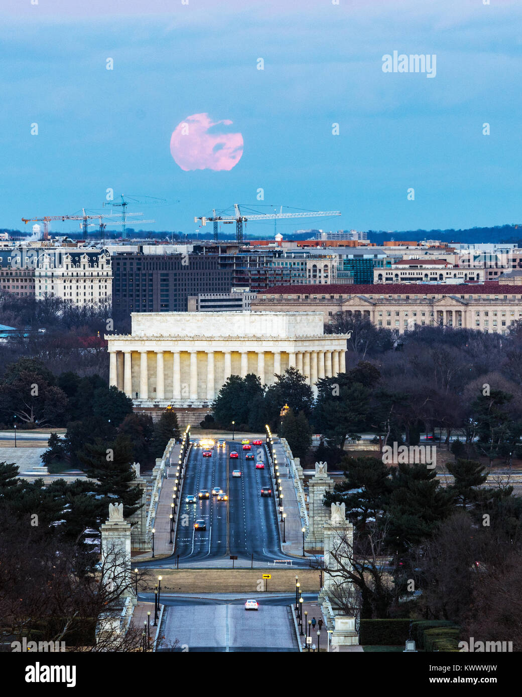 Washington DC/USA - JANUARY 1, 2018 - Full Wolf Moon rises over the Lincoln Memorial on the first day of the new year. Stock Photo