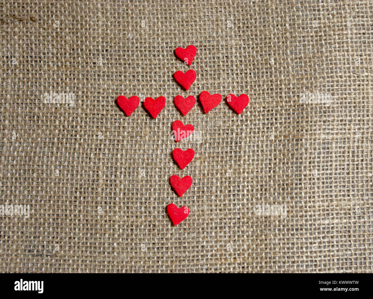 Centered candy heart cross Stock Photo Alamy