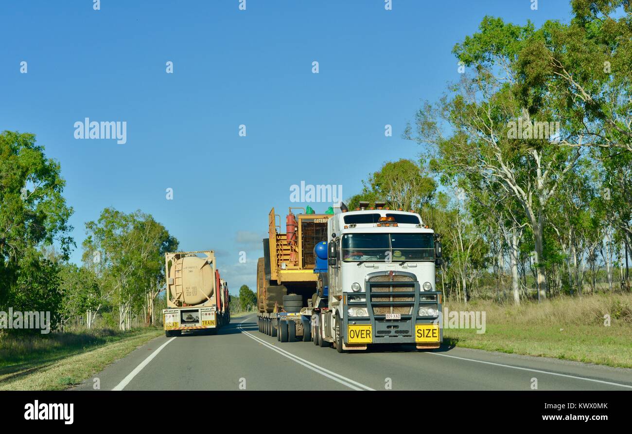 Road train on a highway, a classic australian scene, the road between ...