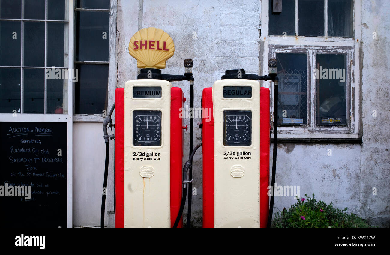 Antique Shell petrol pumps are seen in the seafront street in St. Mawes, Cornwall, Britain January 5, 2018. Stock Photo