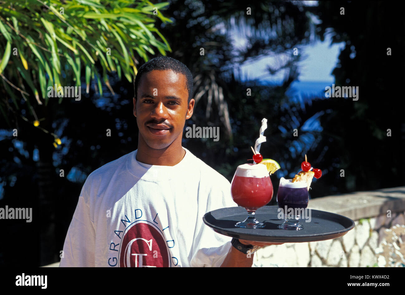 Barkeeper with Coktails, Jamaica Stock Photo