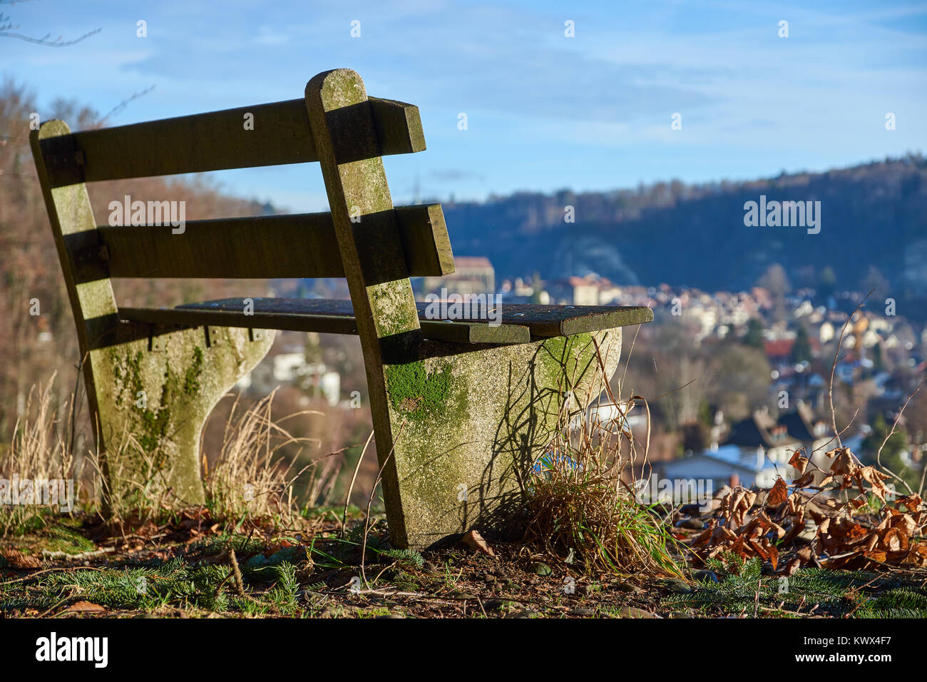 emty bench over the small town Stock Photo