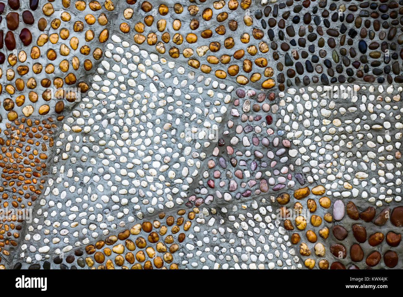 pebble wall texture beautiful pattern background Stock Photo - Alamy