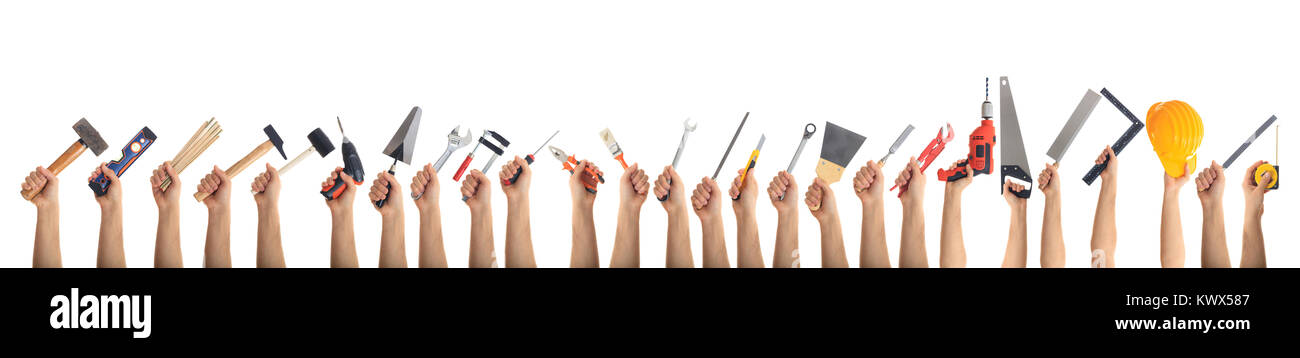Hands holding hand tools on white background Stock Photo - Alamy