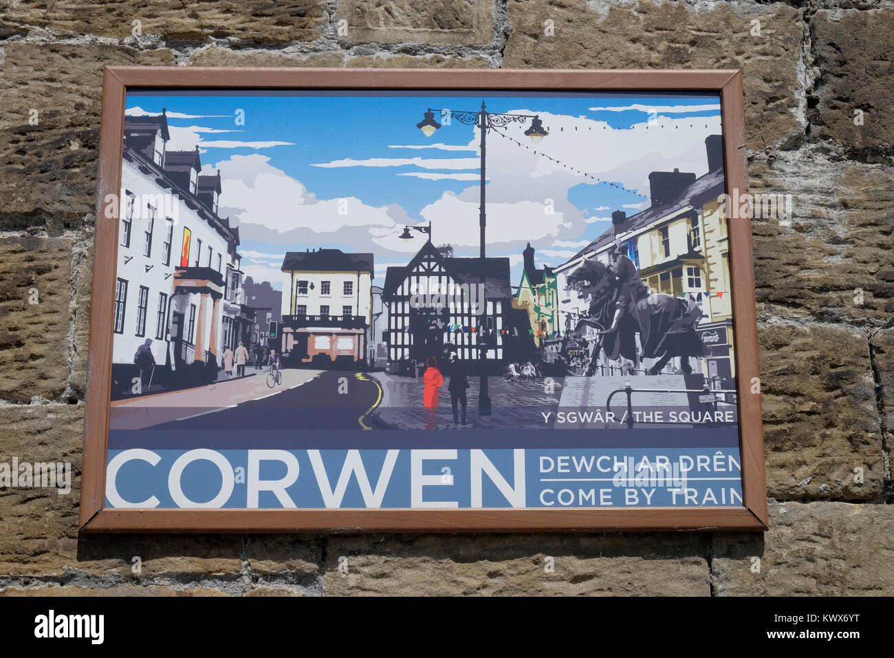 Painted advert for rail travel at Llangollen railway station, Denbighshire, Wales. Stock Photo