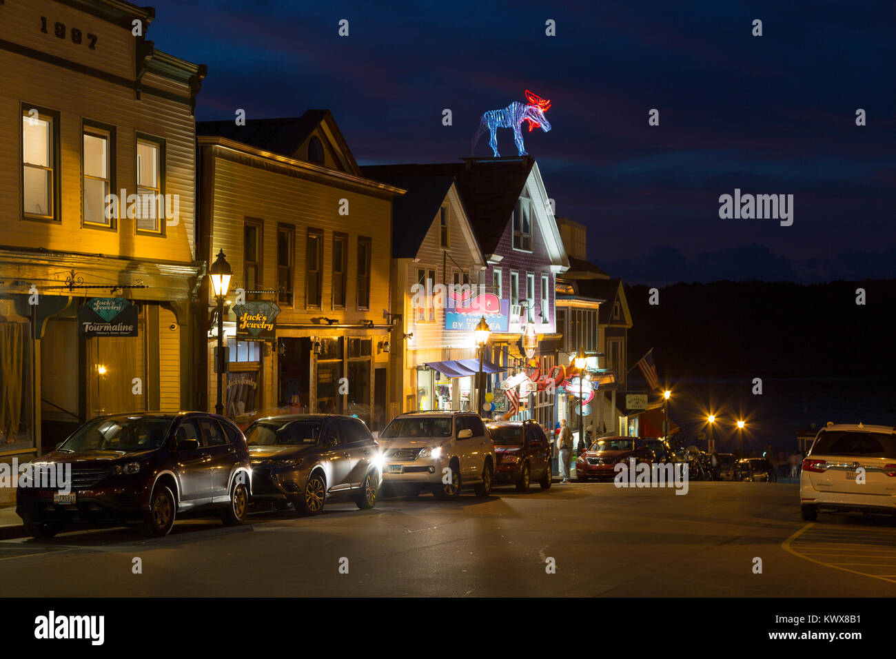 A neon moose tops a gift shop along Main Street. Bar Harbor, Maine Stock Photo