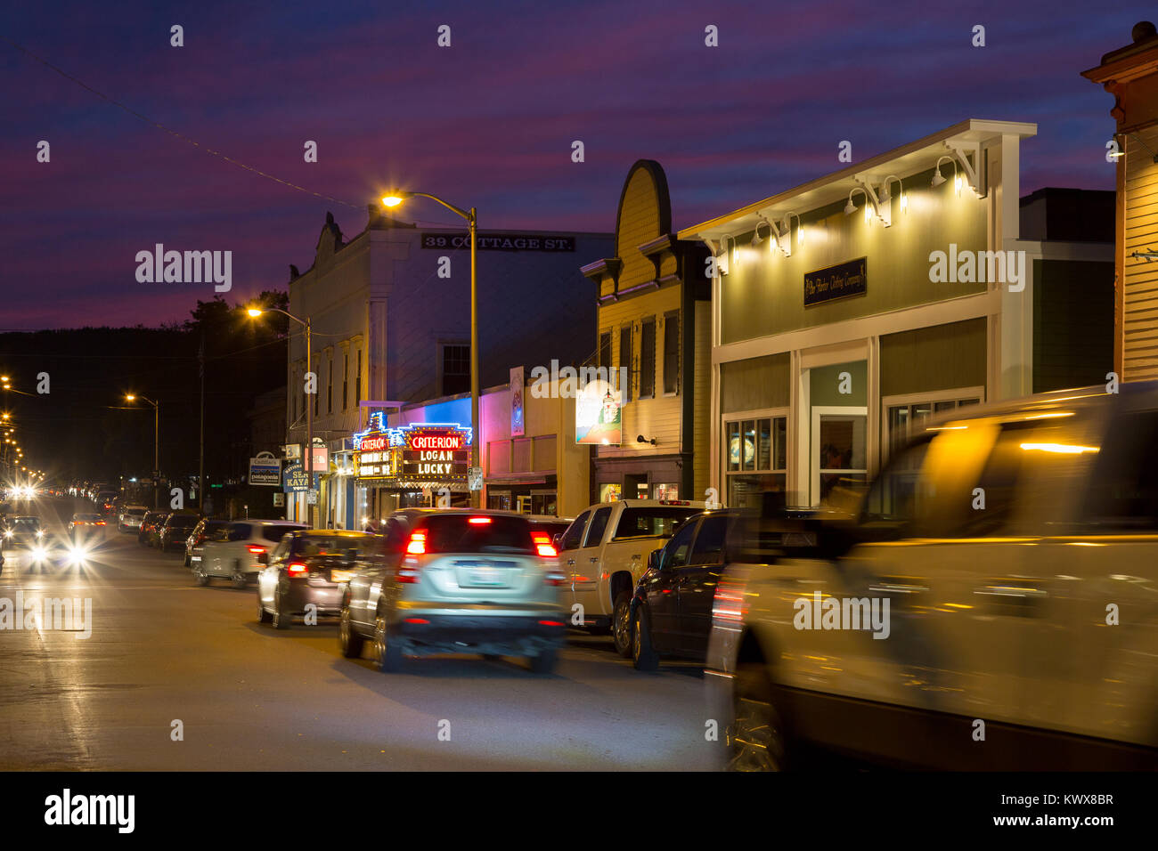 Cars driving by the old Criterion Theater on Cottage Street. Bar Harbor, Maine Stock Photo