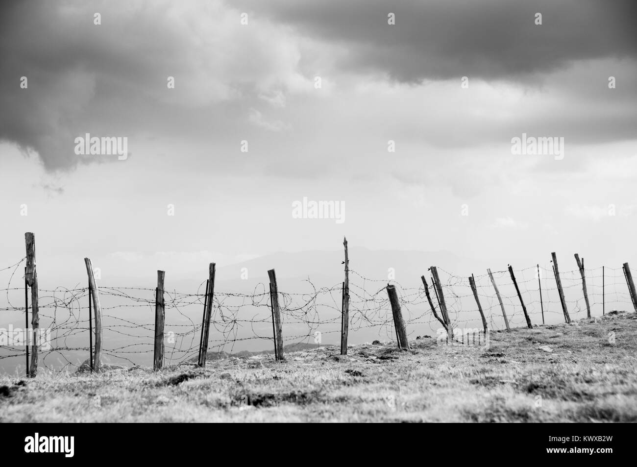 Fencing in the rugged Pyrenean mountains Stock Photo