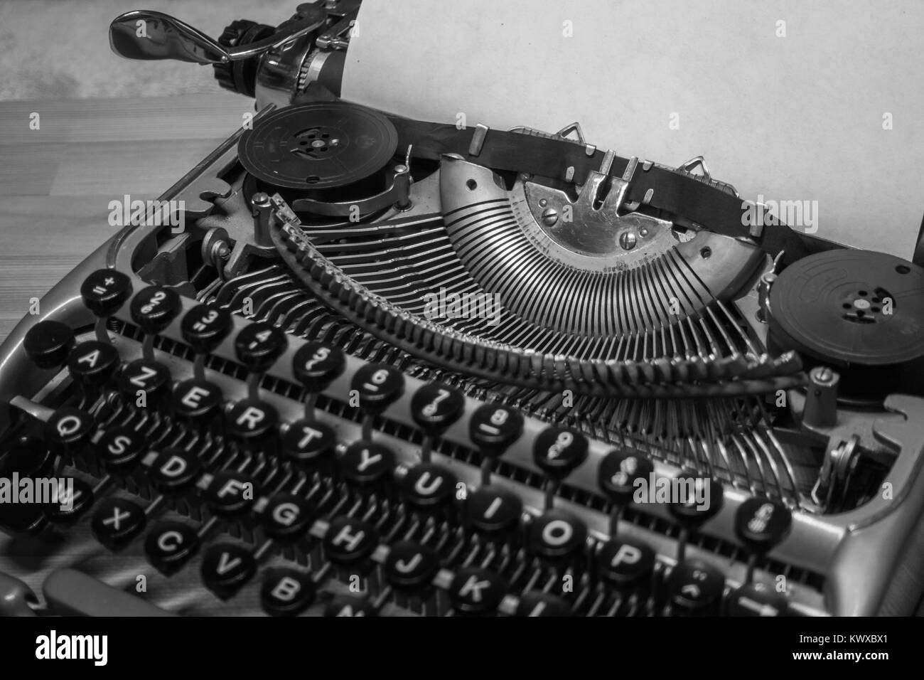 Typewriter ready for use with blank paper installed Stock Photo