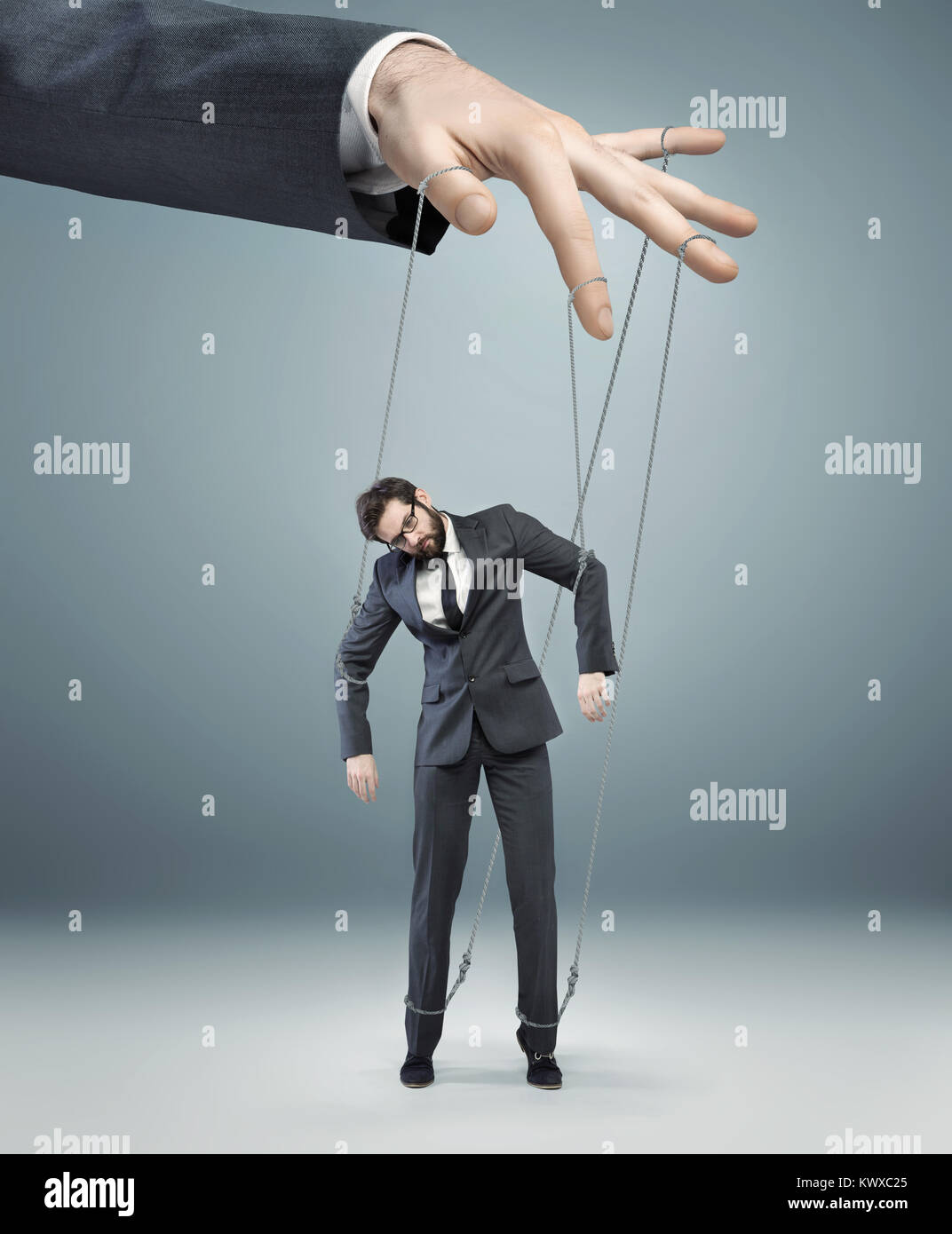 Man pulling strings hires stock photography and images Alamy