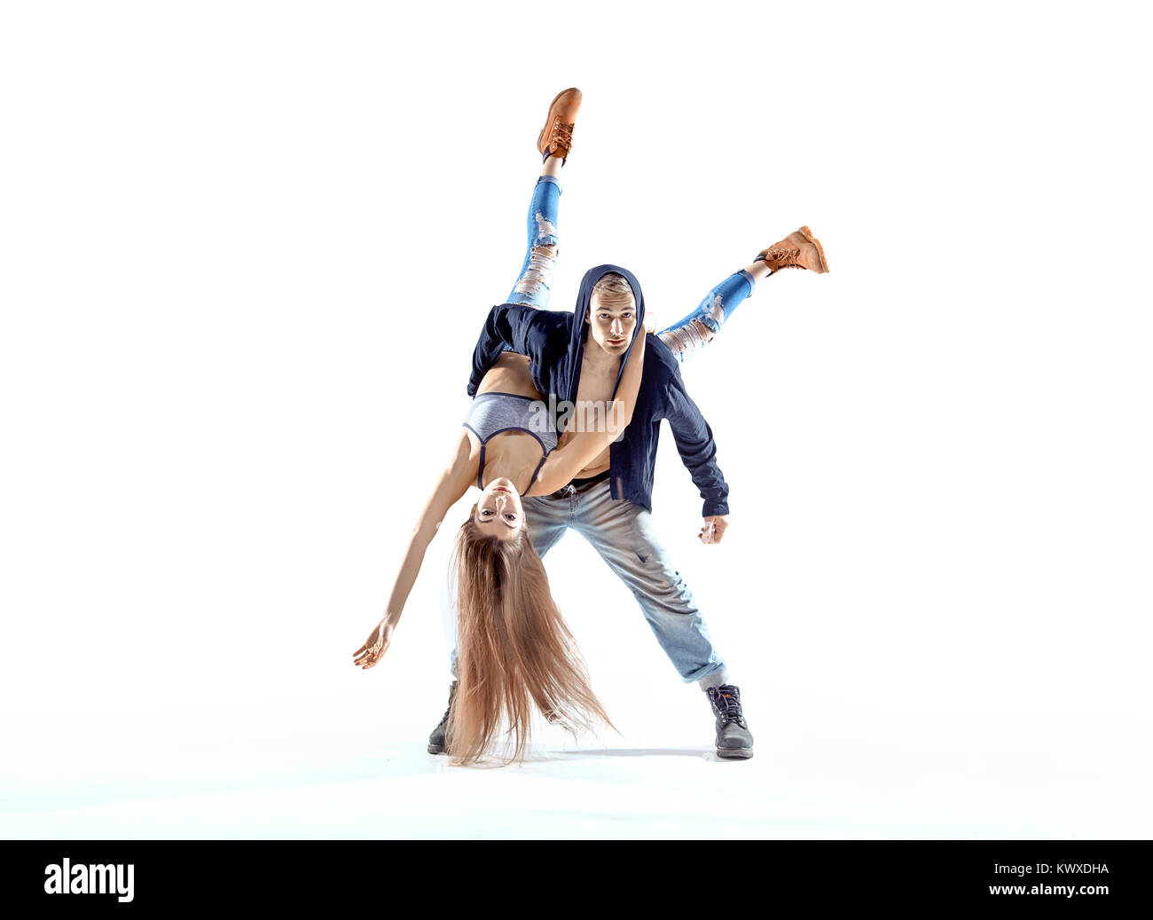 Strong hip-hop boy carrying his dance partner Stock Photo - Alamy
