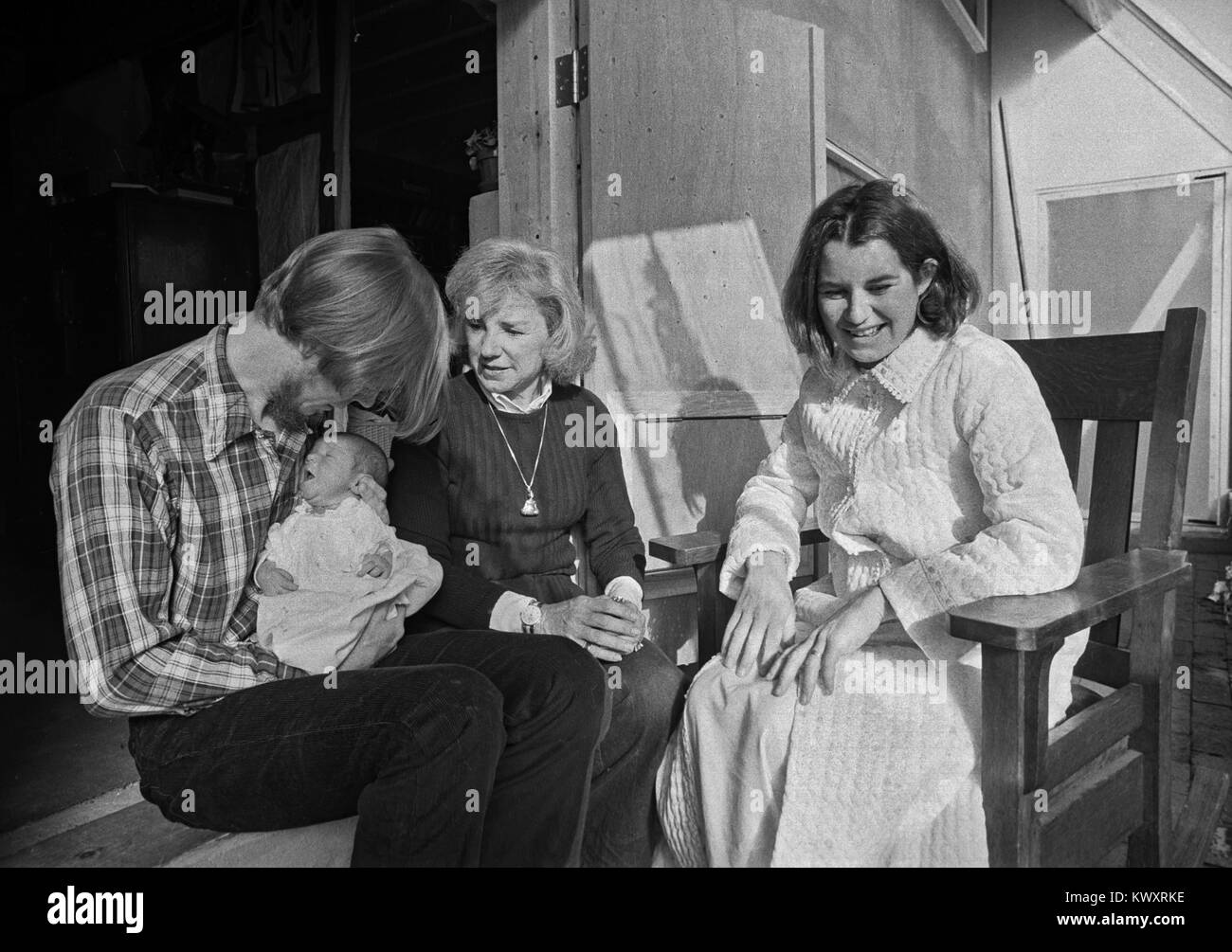 David Townsend (left), Ethel Kennedy (center), Kathleen Kennedy Townsend (right), and newborn baby Meaghan Anne Townsend, in 1977 in Santa Fe, New Mexico. Ethel Kennedy (wife of Robert Kennedy) was in Santa Fe visiting her daughter Kathleen. Stock Photo