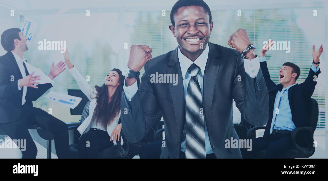 Business team celebrating a triumph with arms up Stock Photo - Alamy