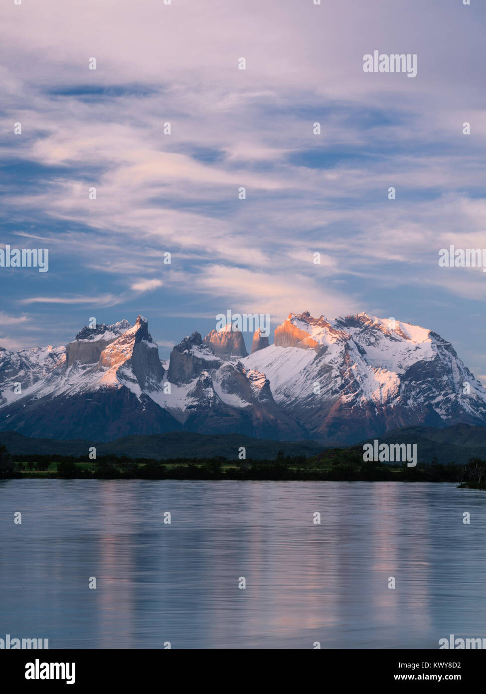 Sunset view of Torres del Paine National Park over Rio Serrano, Tyndall, Chile. Stock Photo