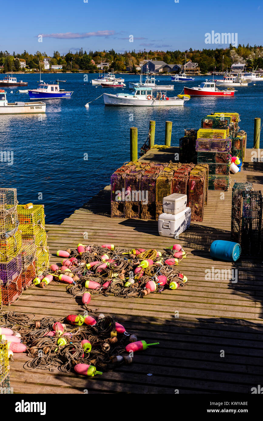 Fishing boats and lobster fishing equipment at wharf in Bernard Maine. Stock Photo
