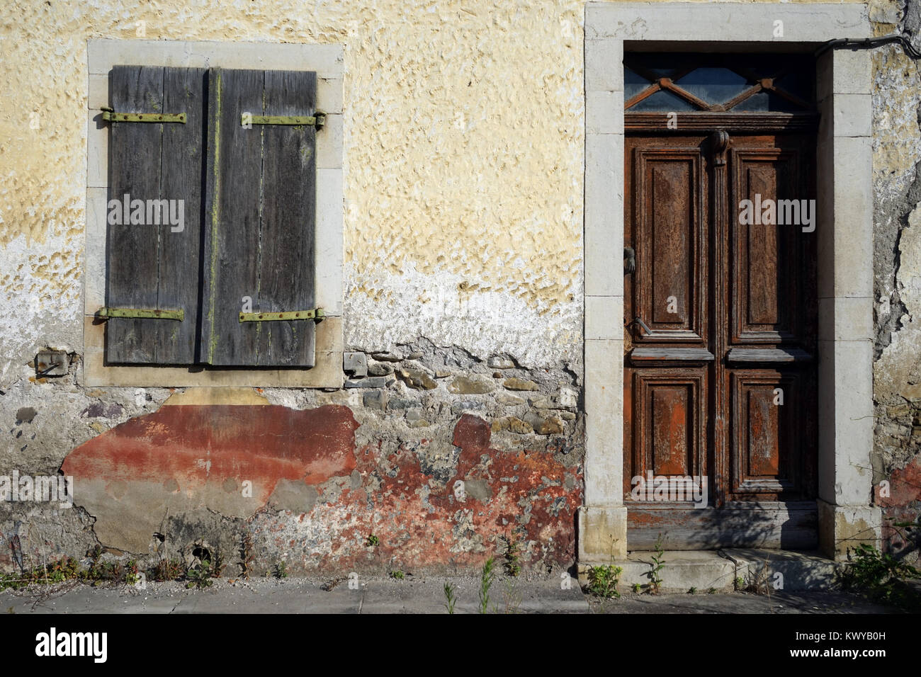 Door and window of old stone house on the street in France Stock Photo ...