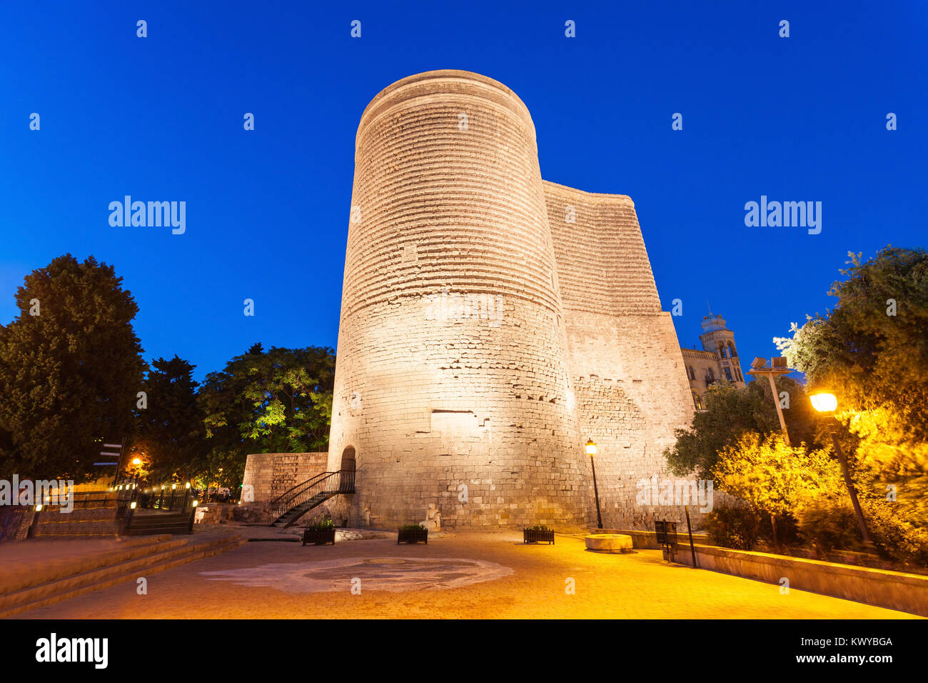 The Maiden Tower at night. It is also known as Giz Galasi and located in the Old City in Baku, Azerbaijan. Stock Photo