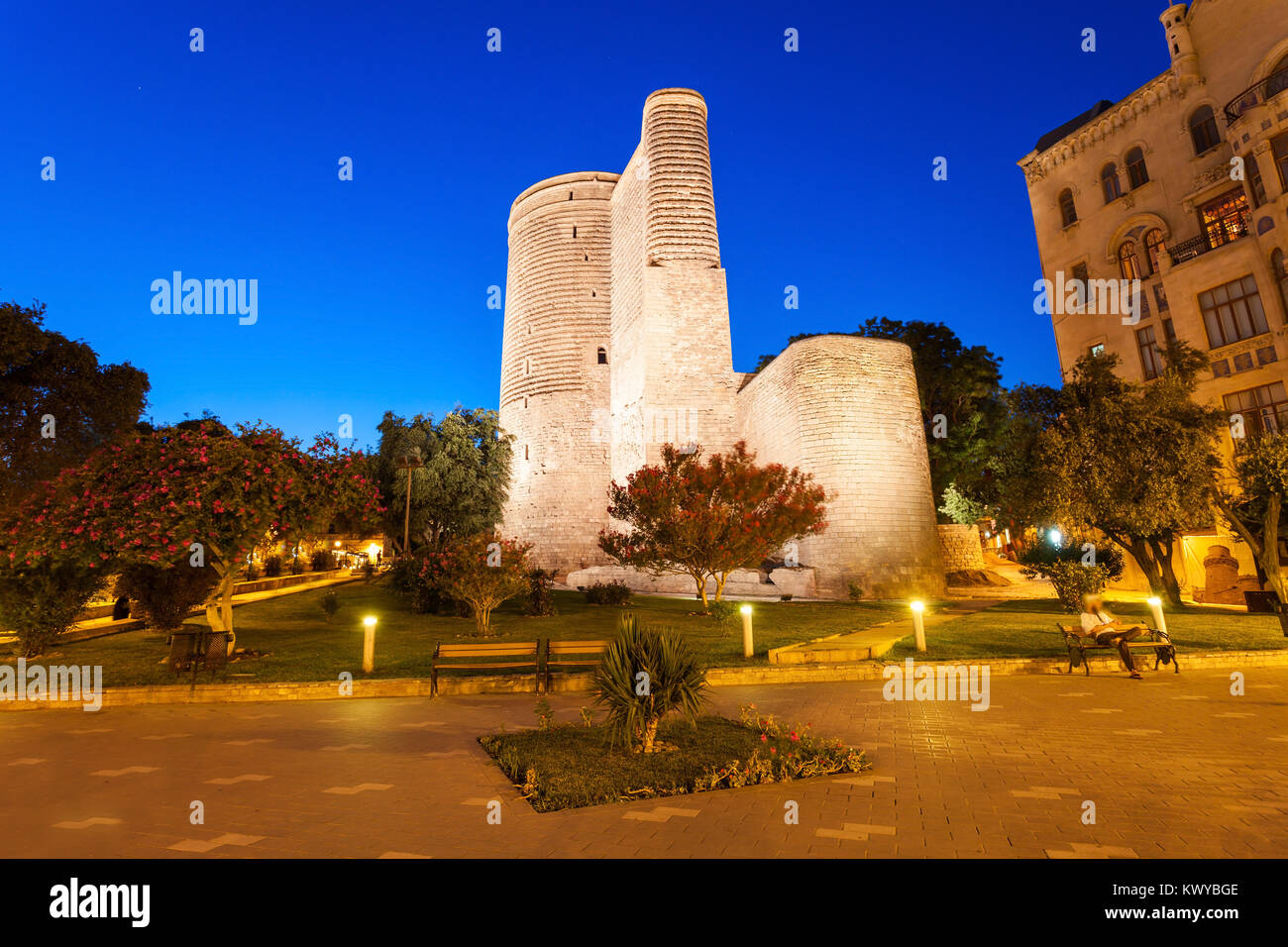 The Maiden Tower at night. It is also known as Giz Galasi and located in the Old City in Baku, Azerbaijan. Stock Photo