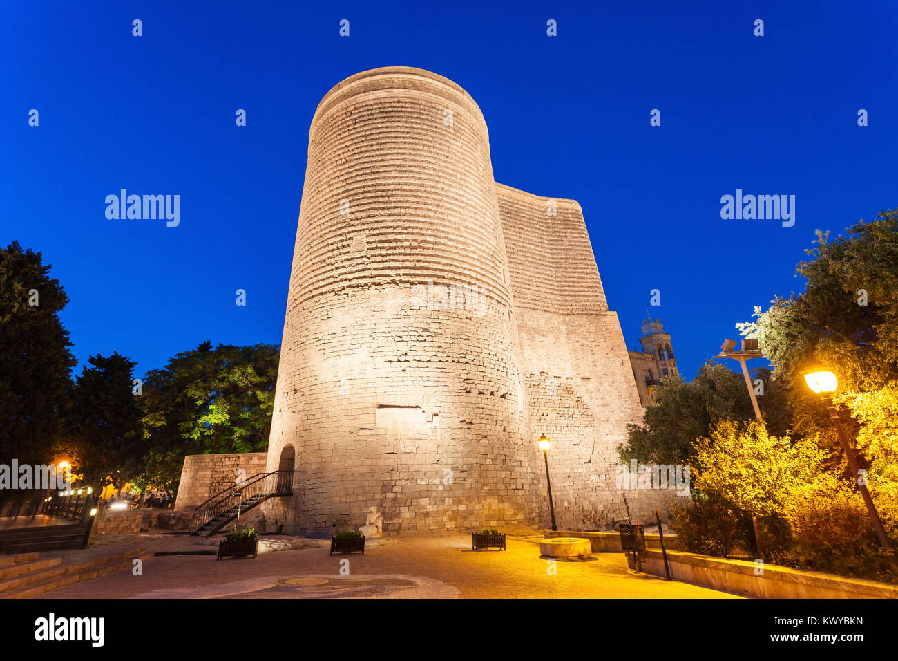 The Maiden Tower at night. It is also known as Giz Galasi and located in the Old City in Baku, Azerbaijan. Stock Photo