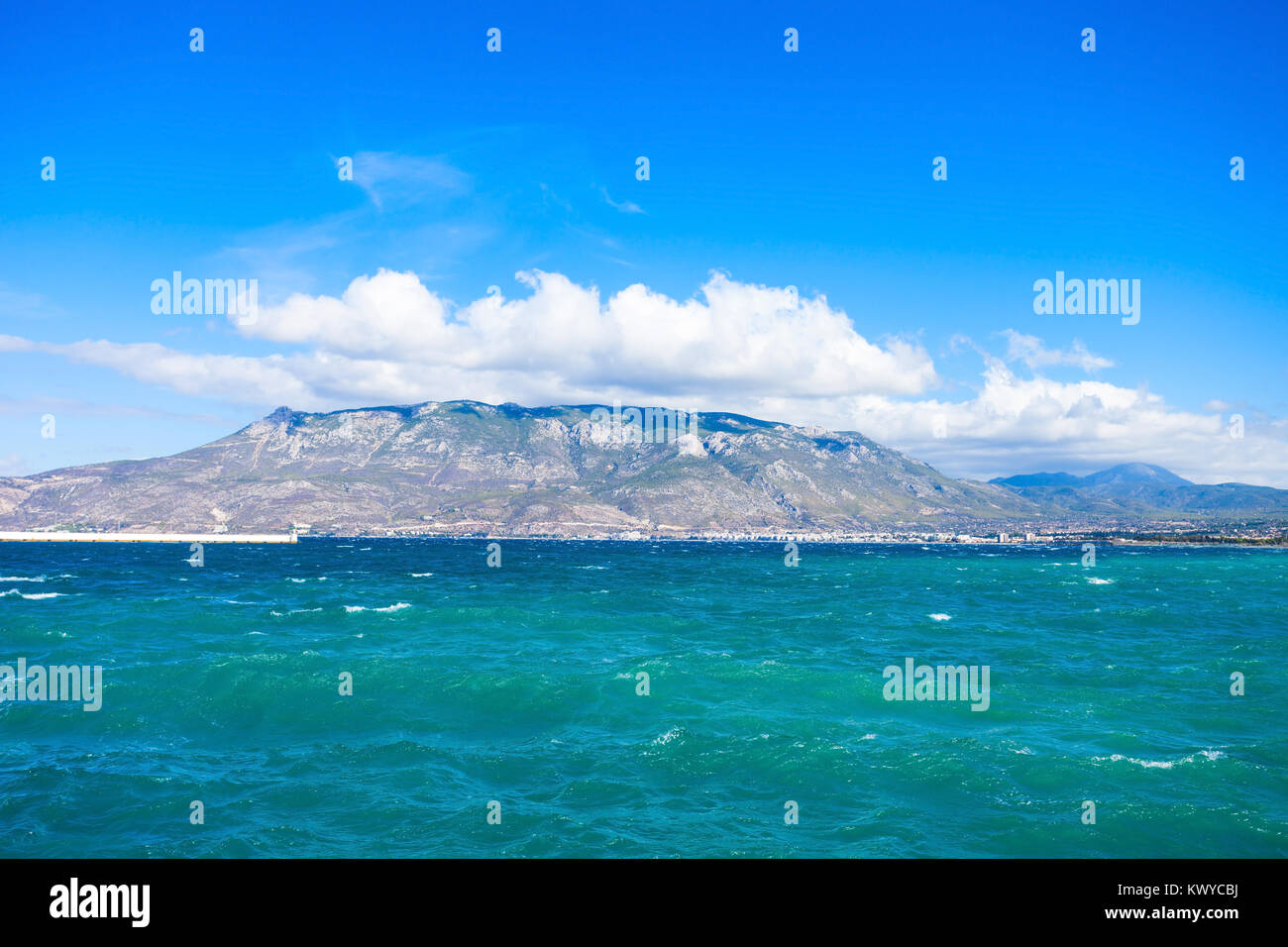 Gulf of Corinth and Loutraki city on background, view from Corinth city embankment, Peloponnese peninsula in Greece. Stock Photo