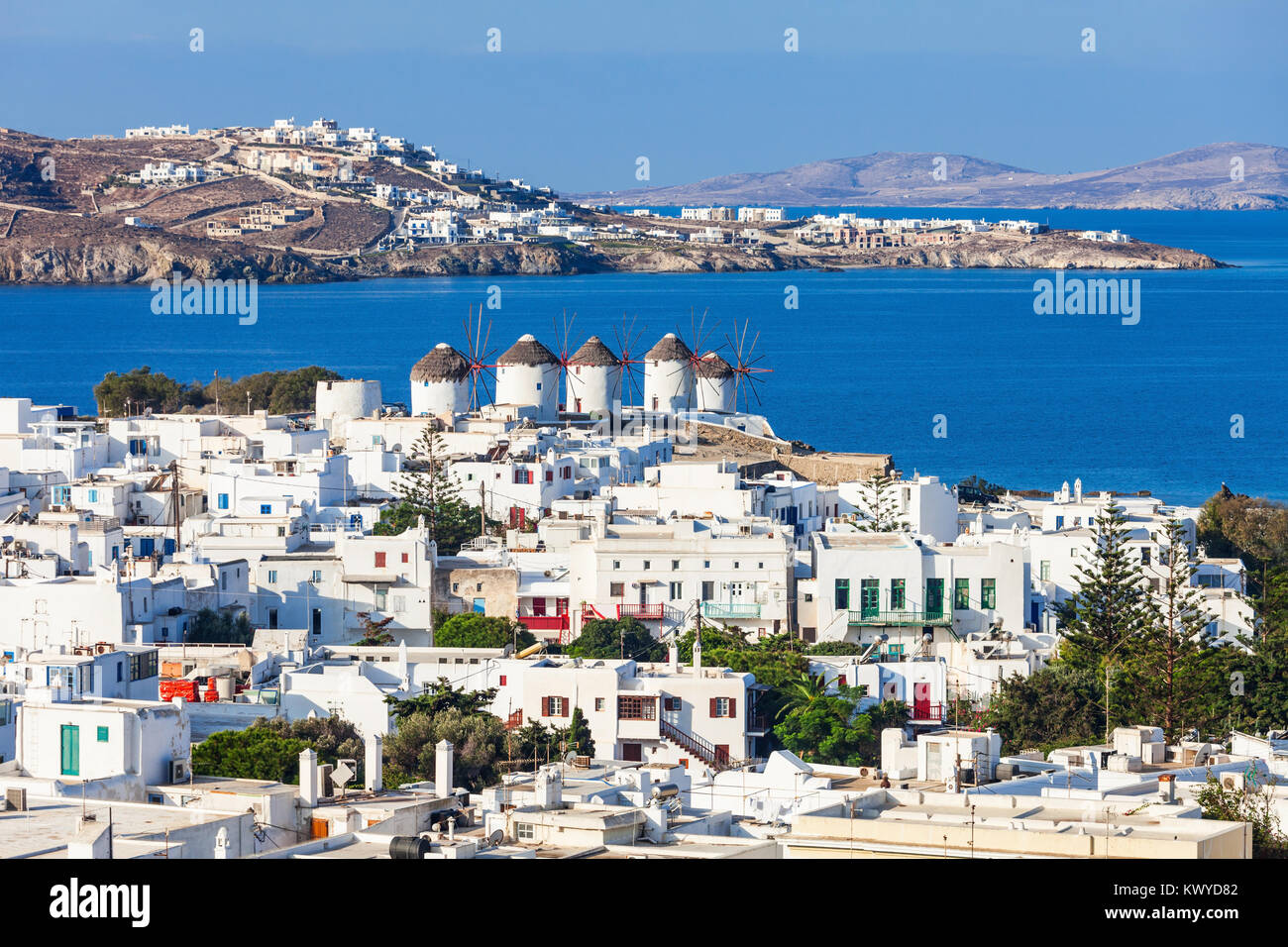 The Mykonos windmills are iconic feature of the Greek island of the Mykonos. The island is one of the Cyclades islands in the Aegean Sea, Greece. Stock Photo