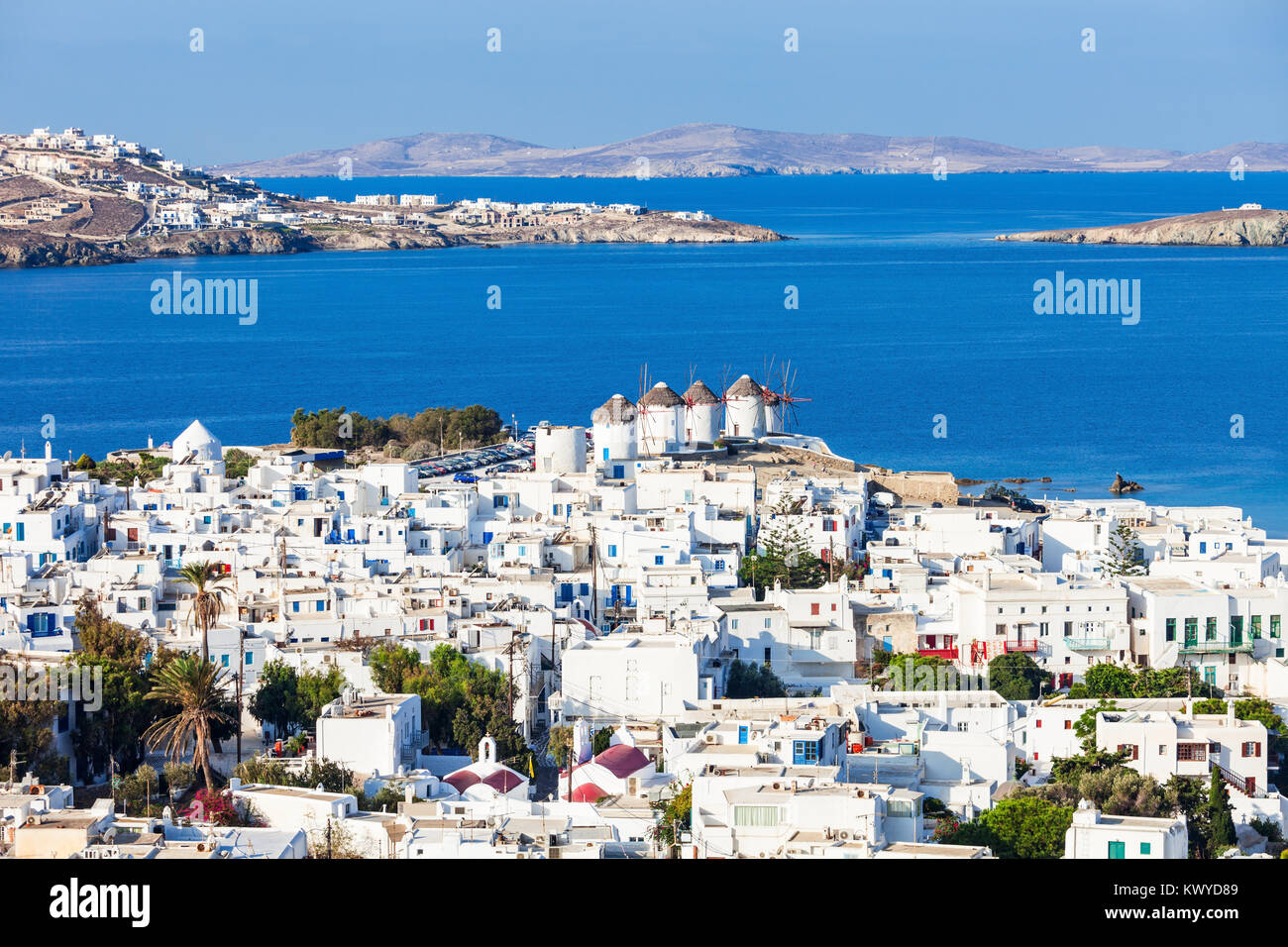 The Mykonos windmills are iconic feature of the Greek island of the Mykonos. The island is one of the Cyclades islands in the Aegean Sea, Greece. Stock Photo