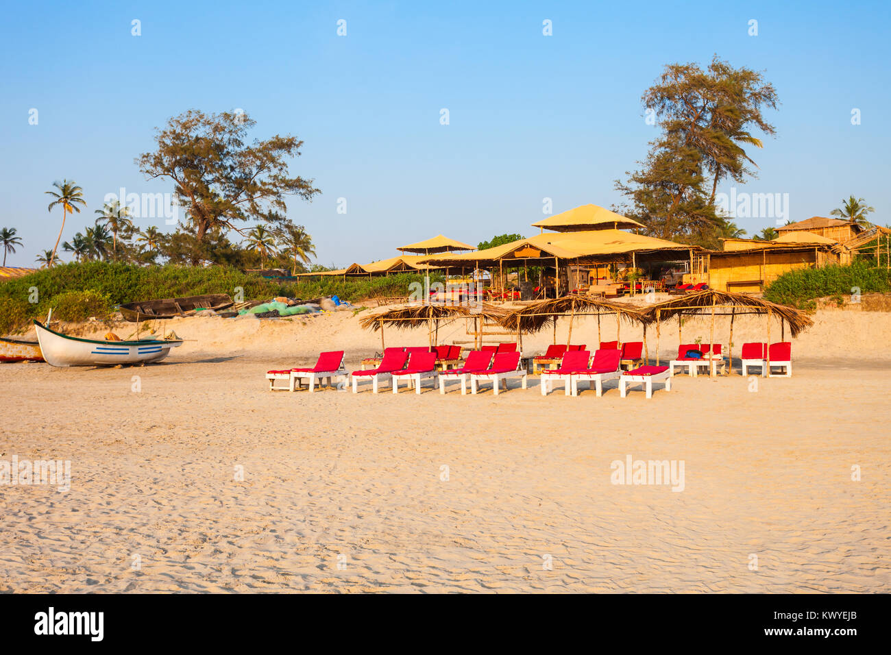 Beach restaurant shacks and sunbeds on Arambol beach in north Goa