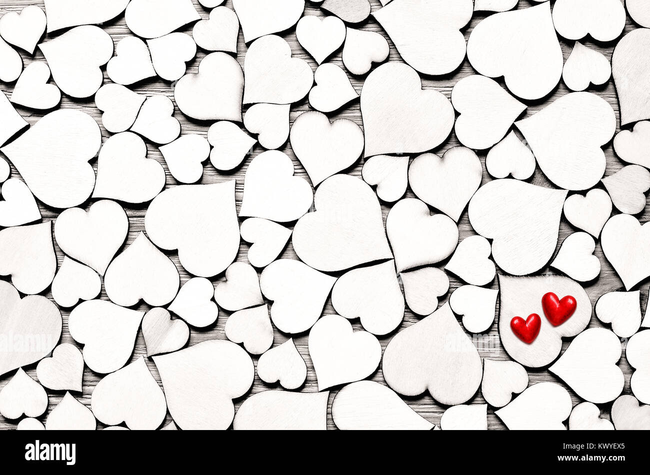 Little wood red hearts on wood heart background, valentine day concept ...
