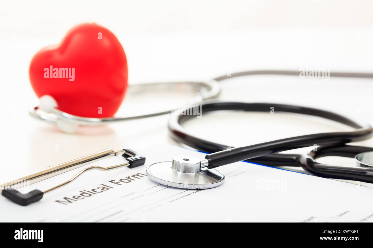 Heart and a stethoscope on white background Stock Photo - Alamy
