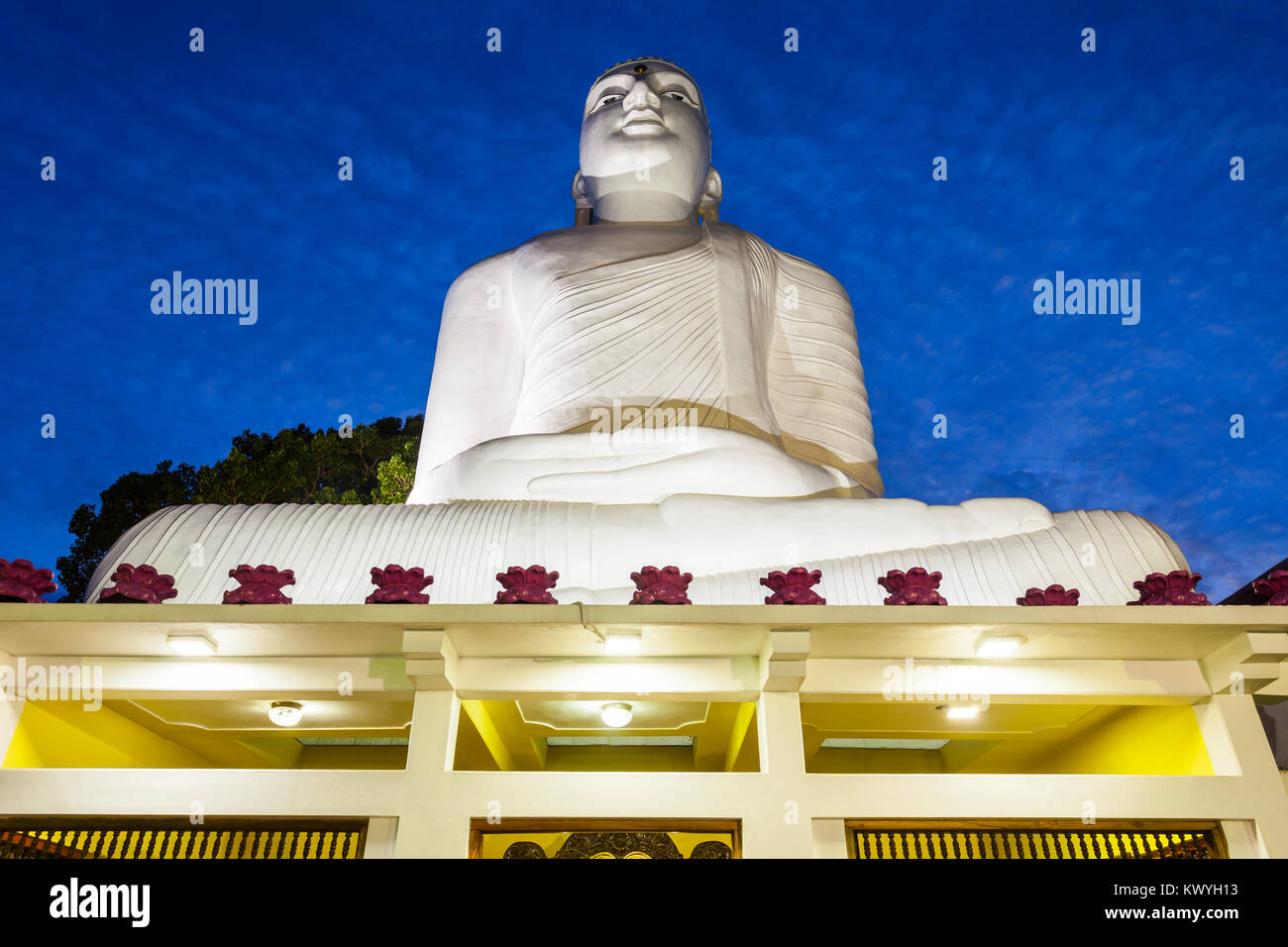 Bahirawa Kanda or Bahirawakanda Vihara Buddha Statue in Kandy, Sri Lanka at sunset. Bahirawakanda is a giant samadhi buddha statue on the top of the m Stock Photo